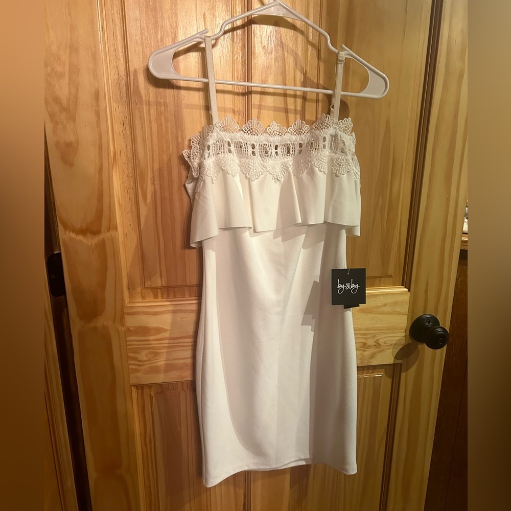White ruffle mini dress